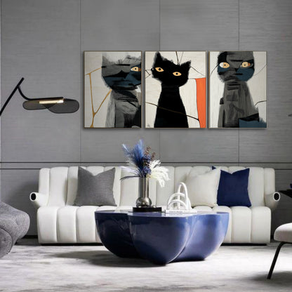 Geometric cat triptych contrasting with a plush white sofa and bold navy blue table, adding an edgy, modern touch to the glamorous space.