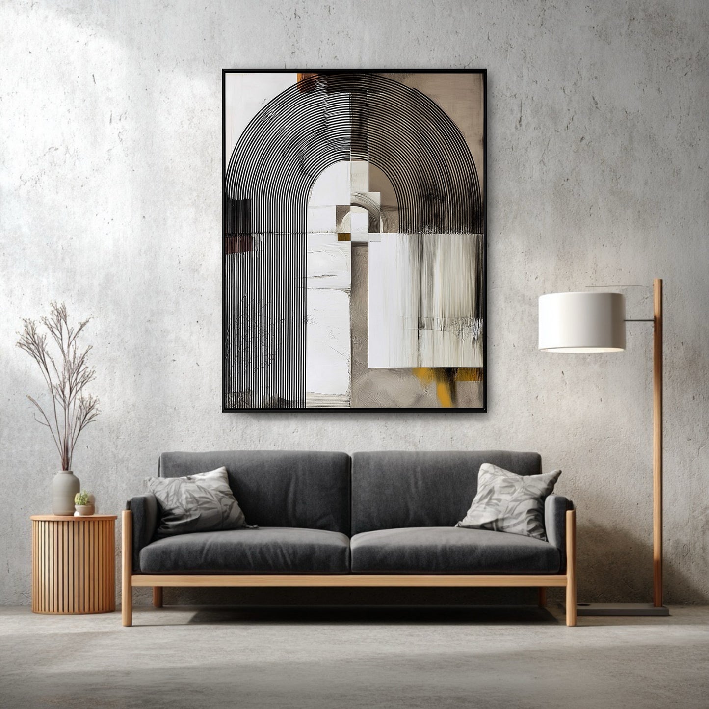 Original modern abstract painting hanging above a gray sofa against a minimalist concrete wall in a living room.