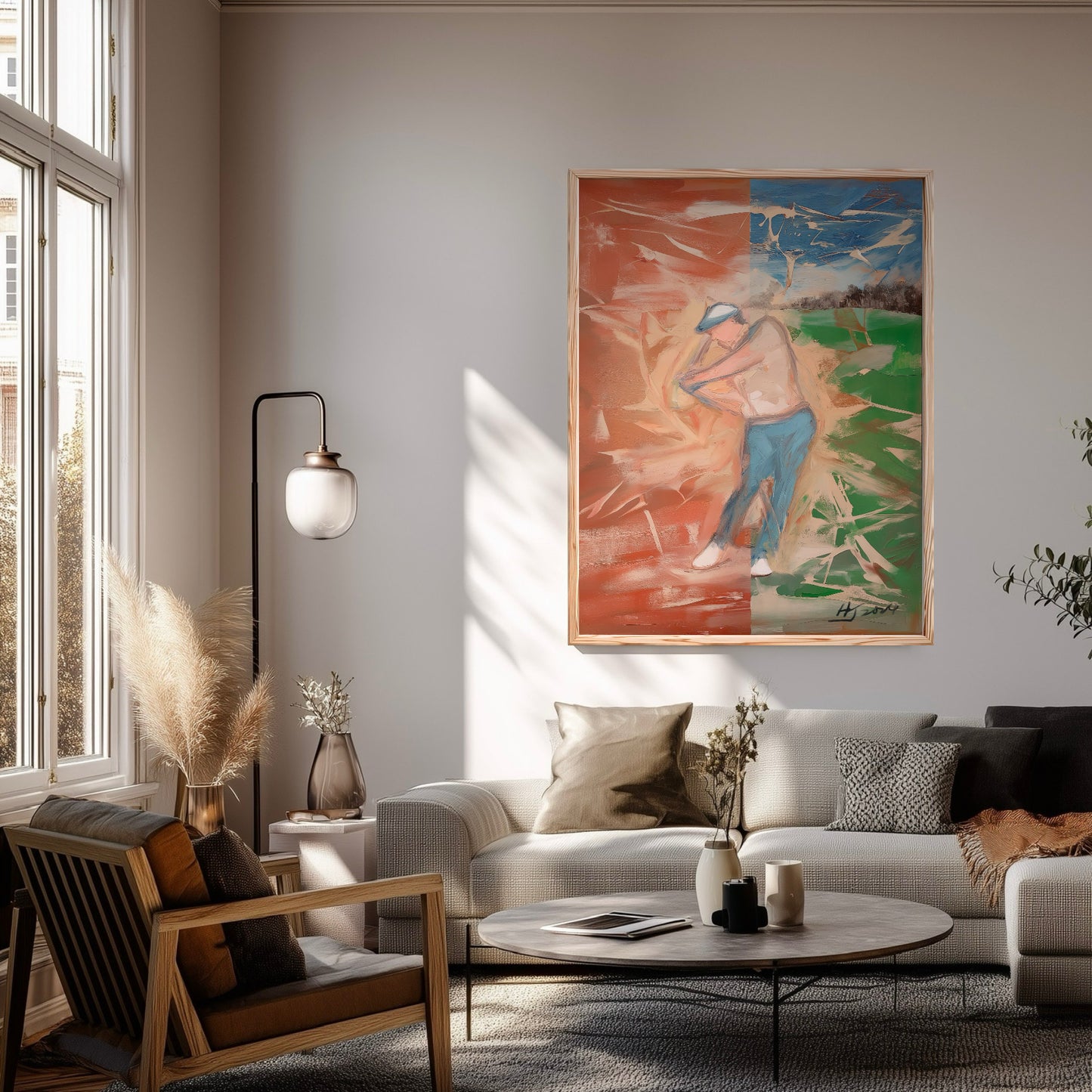 Impressionist golf canvas in a sunlit modern living room. Vibrant split colors add energy above a neutral grey sofa and lamp.