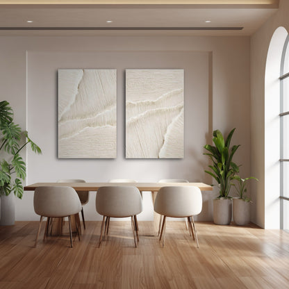 Warm abstract diptych in a sunlit dining room, complementing natural wood and large green plants for a fresh, coastal vibe.