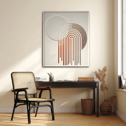 Modern geometric art with arches above a black desk with a rattan chair in a sunlit contemporary home office.