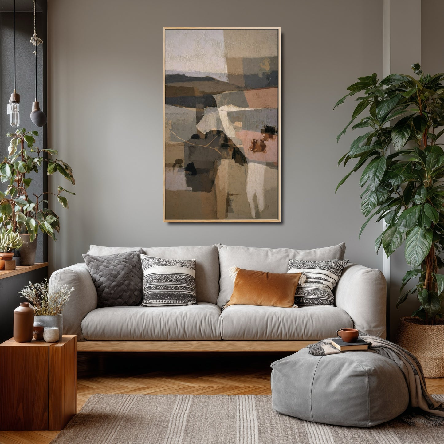 Abstract art seamlessly integrates with the sophisticated gray walls, patterned pillows, and lush plants in this modern urban living room.