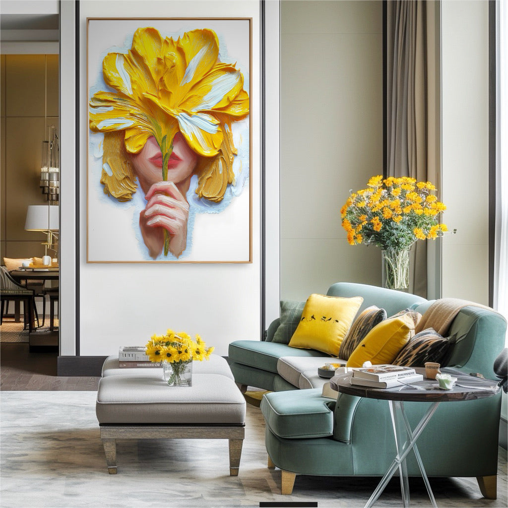 Vibrant yellow and white artwork brightens a stylish living area. The dynamic painting acts as a colorful statement above a teal sofa, illuminated by natural light from a large window.