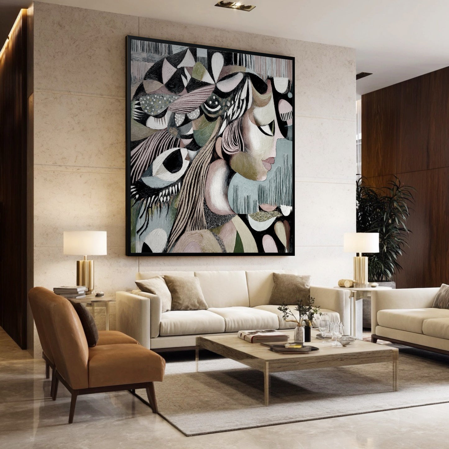 A large abstract female portrait hangs in a sophisticated, neutral-toned living room above an elegant white sofa and table lamps.