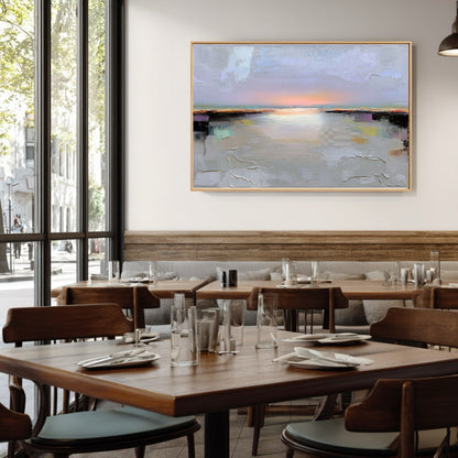 Modern restaurant interior with wooden tables, chairs, and abstract art on the wall.