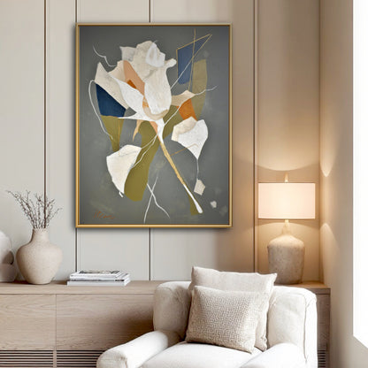 Contemporary white flower painting in a calm reading nook. Cool grey art offers a focal point above a beige textured armchair.