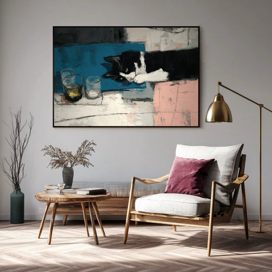 Abstract cat painting hangs in a bright, minimalist lounge above a light gray armchair, with natural wood accents and a brass lamp.
