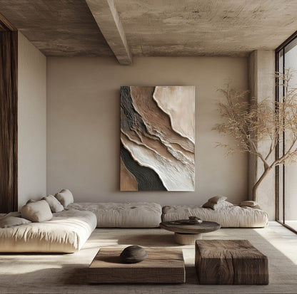 A vertical textured painting with warm earth tones enhances a minimalist, wabi-sabi living room with concrete ceilings and low sofas.