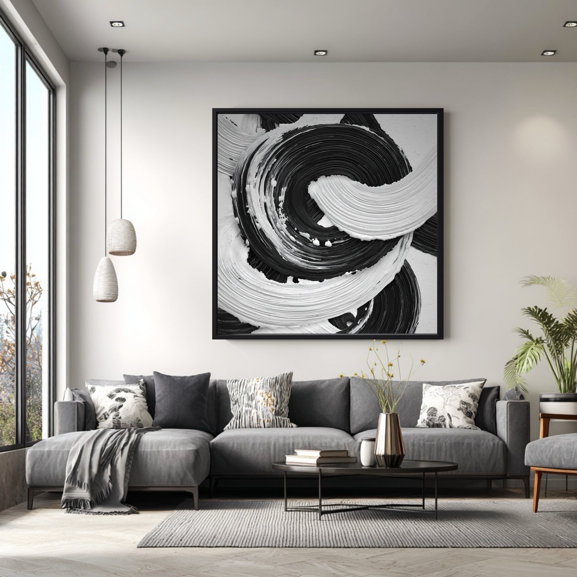Large square abstract painting with a swirling motion above a grey sectional sofa in a modern, minimalist living room.