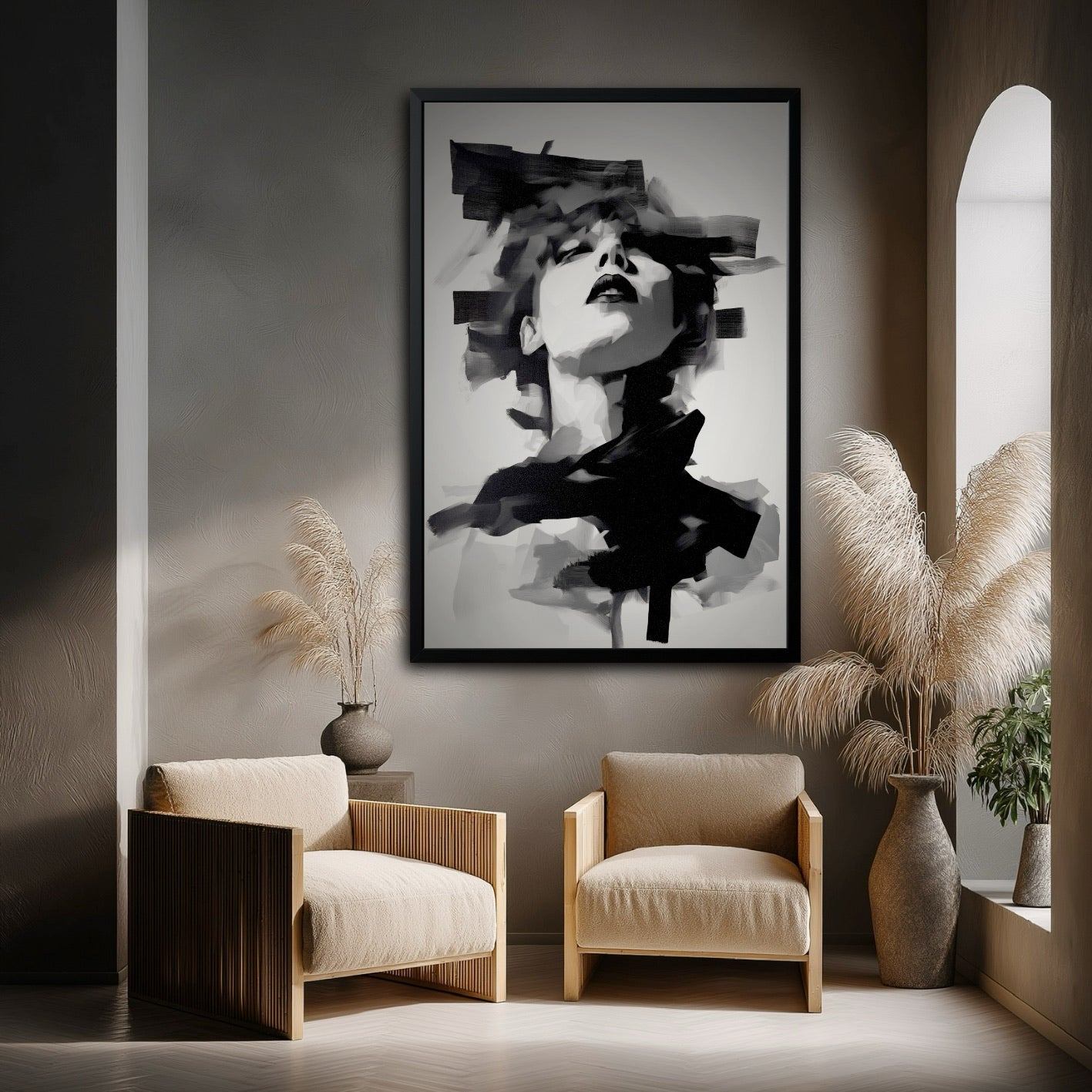 Large abstract portrait in a wabi-sabi style room with two beige armchairs and tall pampas grass in vases.
