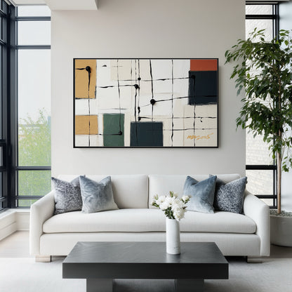 Modern art anchoring a sleek white sofa with blue pillows, perfectly situated against large black-framed city windows.