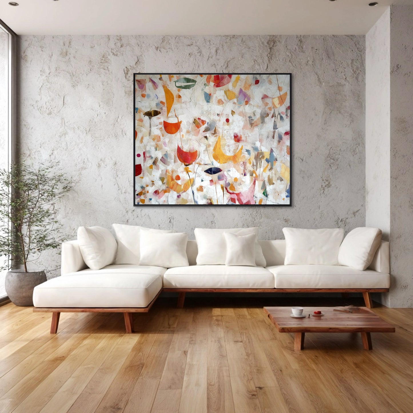 Original Abstract Expressionist painting provides bright, warm color to a clean, minimalist room with white seating and textured concrete walls.