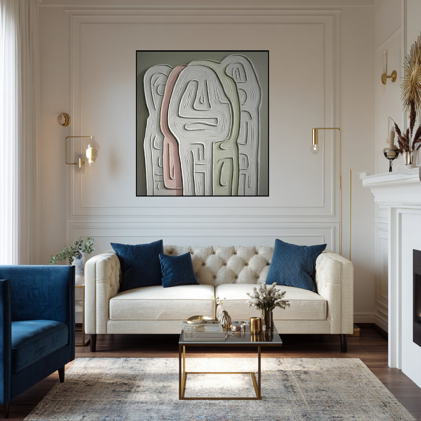  Textured abstract art above a tufted velvet sofa in a classic glam living room with gold accent lighting and wall molding.