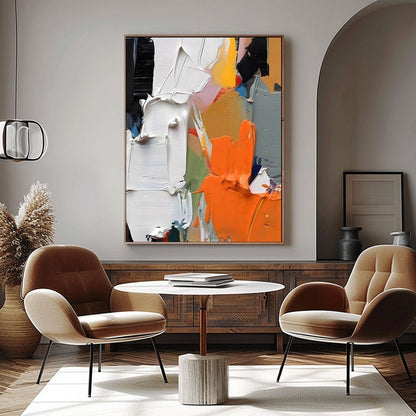 Hand-painted art contrasting with warm velvet chairs, creating a cozy atmosphere beneath an architectural archway.
