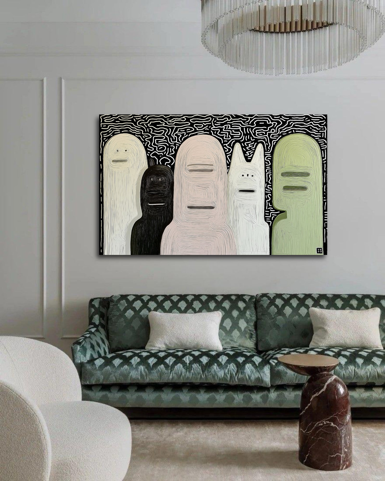 Original abstract group portrait provides a bold focal point over a patterned green velvet sofa in a glam, textured living room.