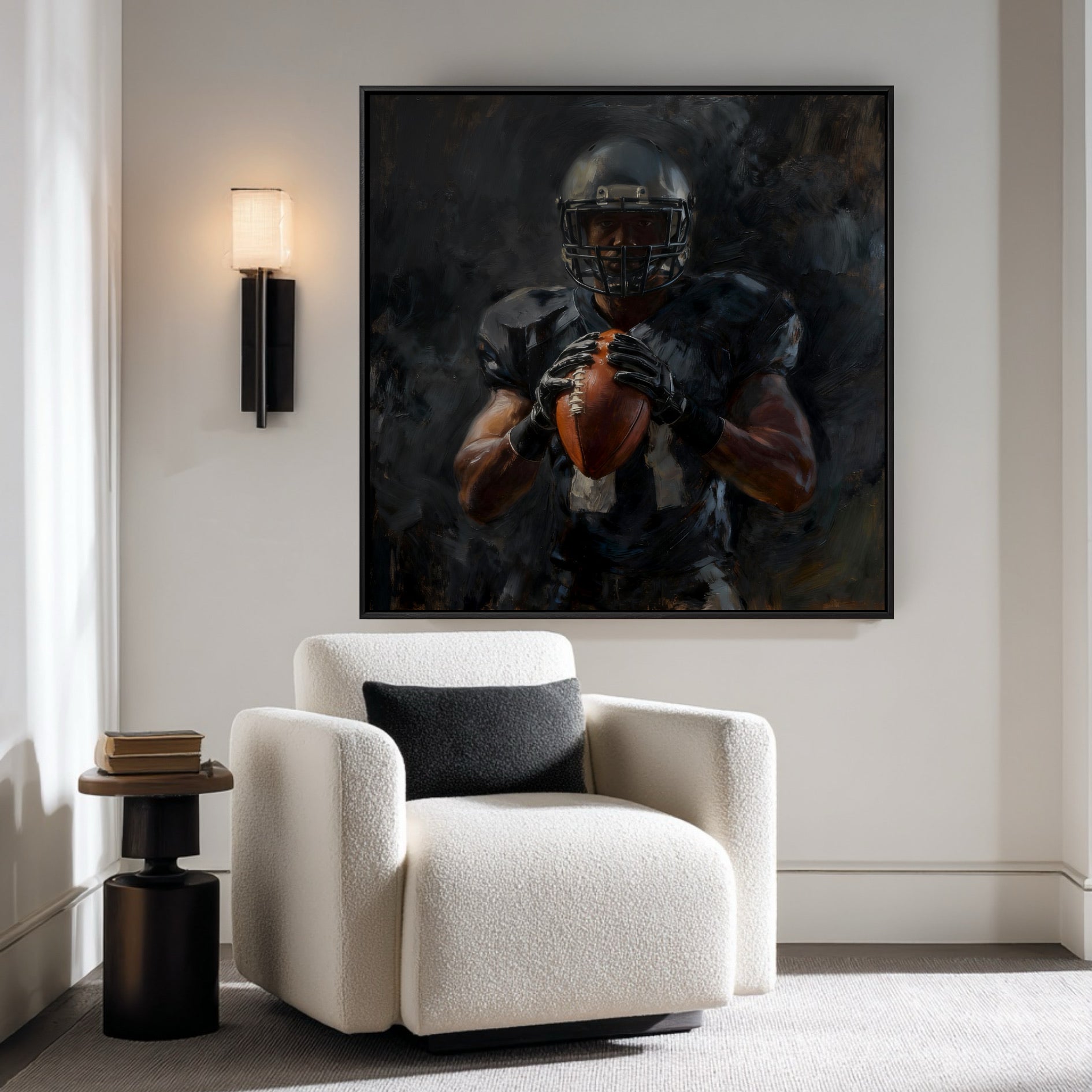Framed football player painting hanging in a cozy, minimalist reading nook with a white boucle armchair and a modern sconce.