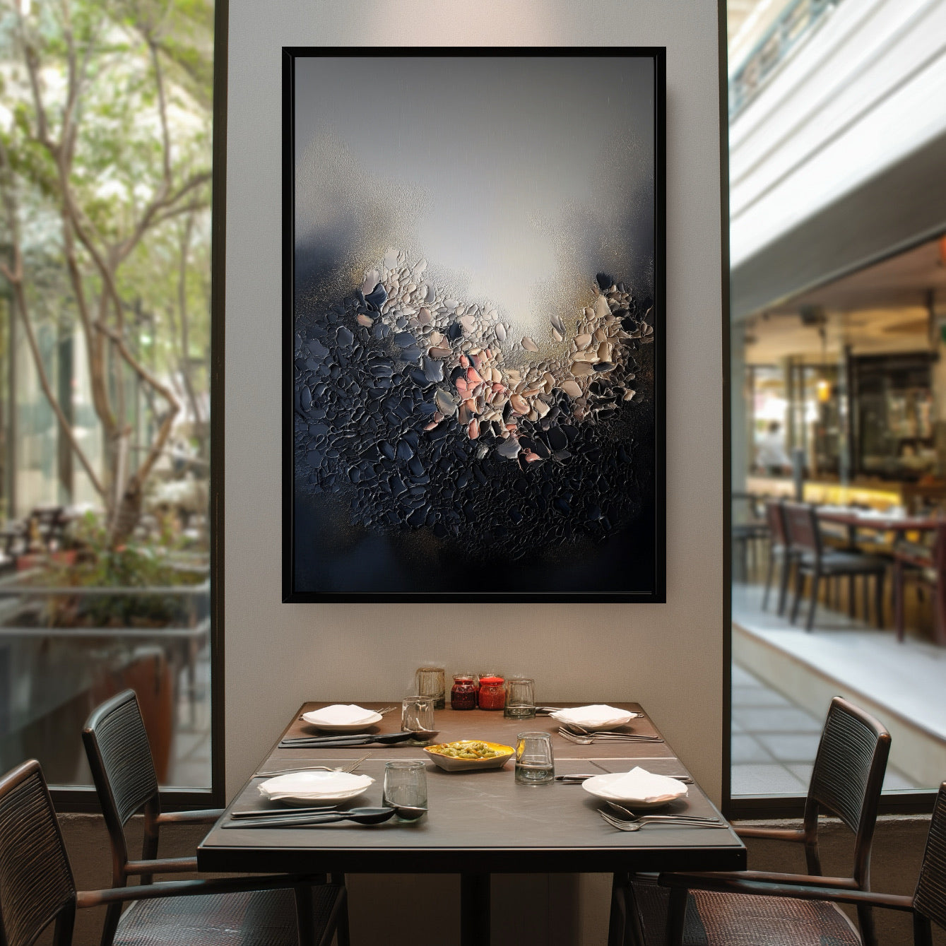 Dramatic textured abstract painting creates an elegant focal point in a stylish restaurant or cafe dining area, framed by large windows.