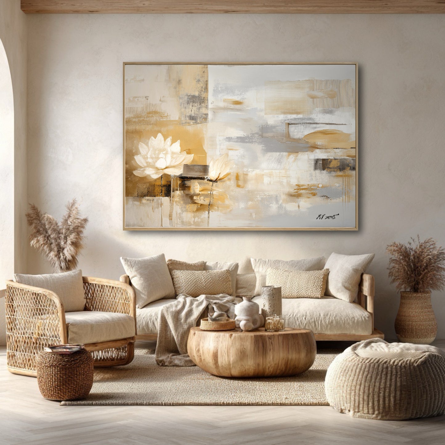 The painting's gold and beige palette perfectly complements the natural wood, rattan chairs, and earthy boho decor in this bright room.