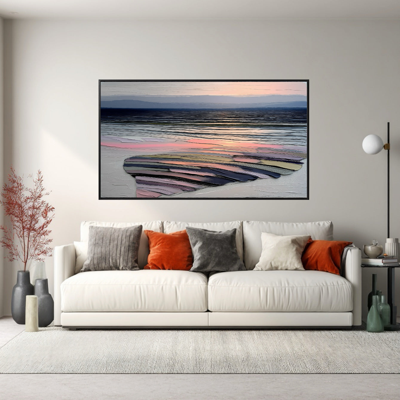 Impasto abstract art above a white sofa with gray and orange pillows in a bright, contemporary, and balanced living room.