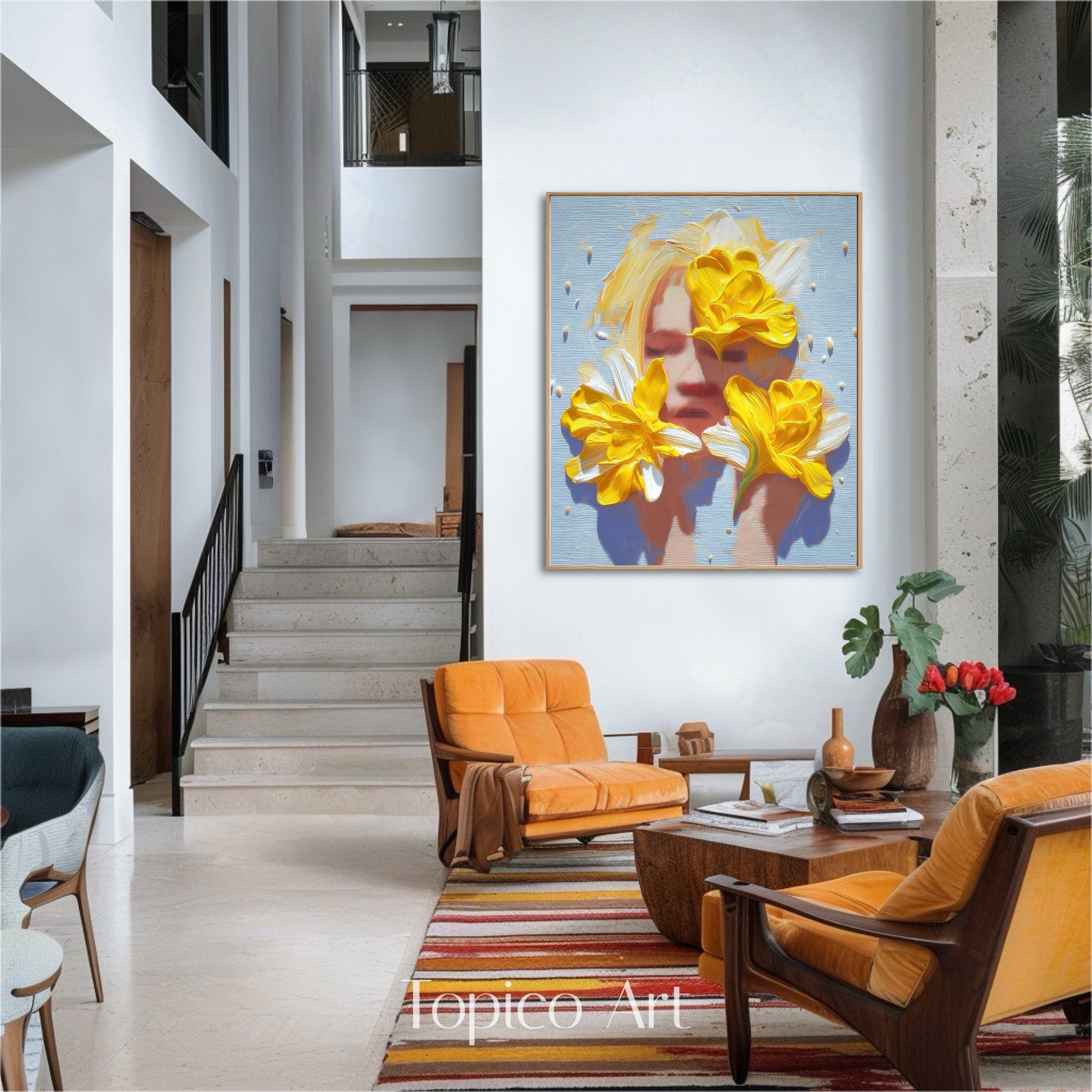 Modern yellow floral art brightens a spacious, architectural atrium setting. The art complements the orange mid-century chairs, striped rug, and the open staircase design.