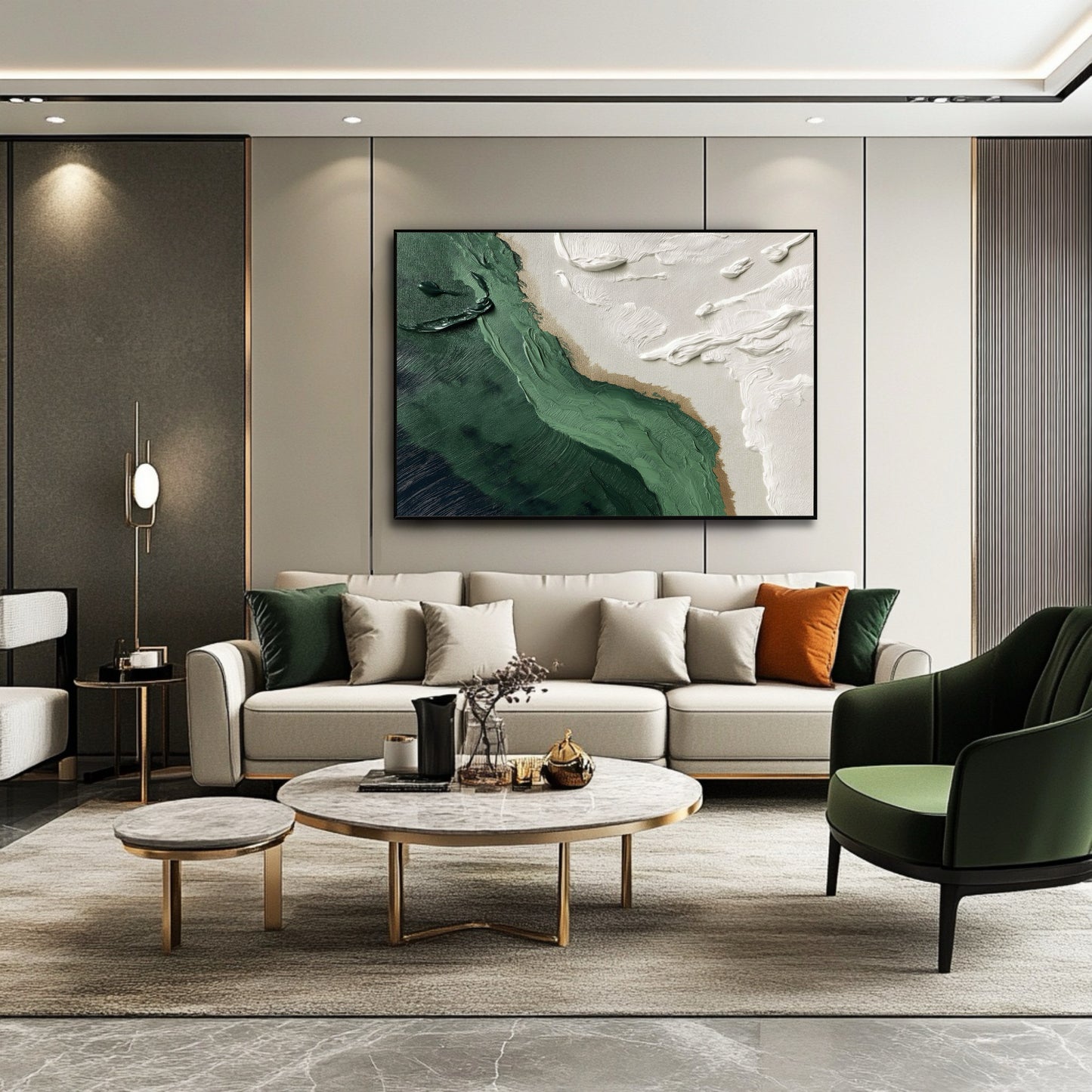 Textured green and white coastal art linking the rich gold trim and emerald accent chair in a luxury, modern living room setting.