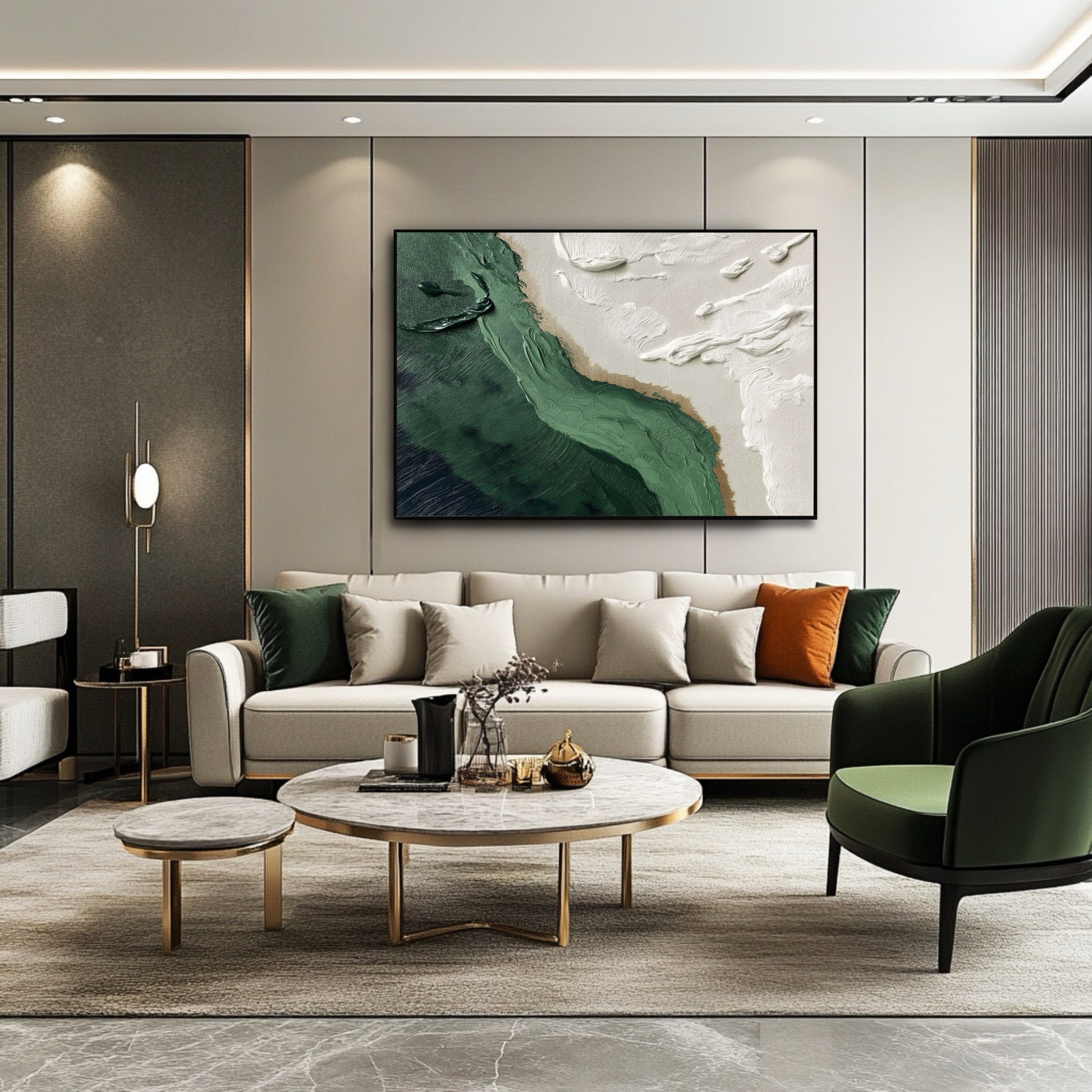 Textured green and white coastal art linking the rich gold trim and emerald accent chair in a luxury, modern living room setting.