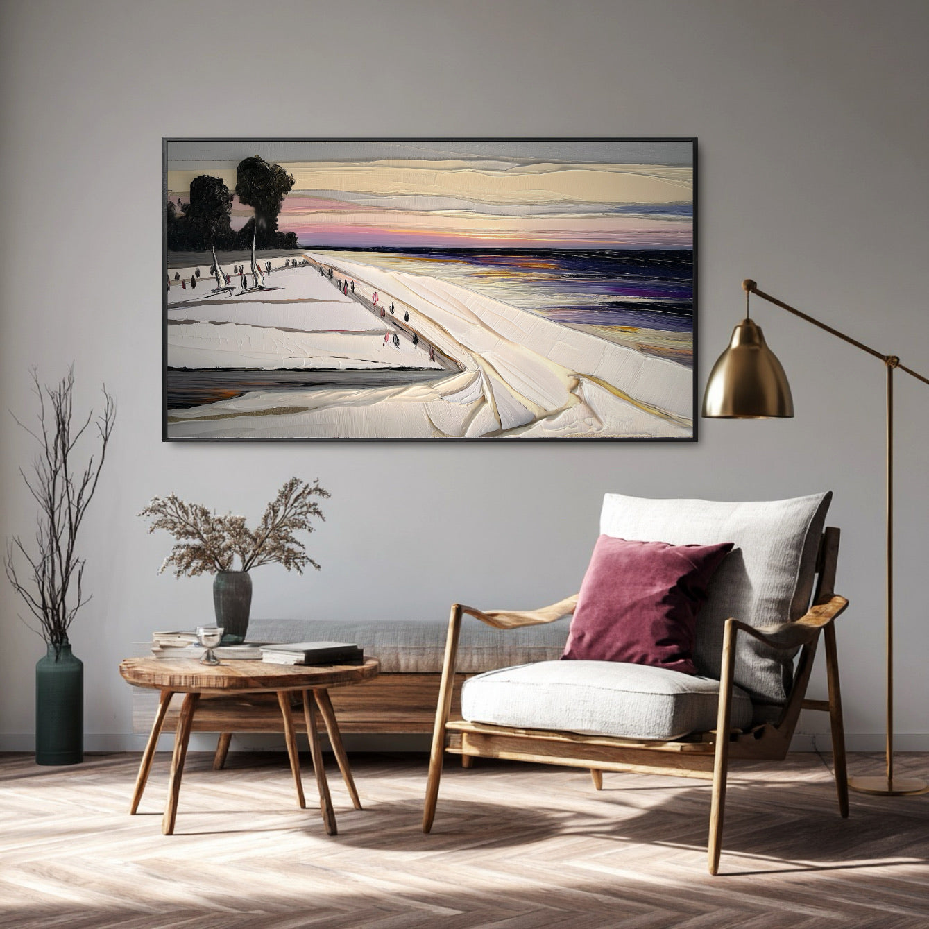 Original textured seaside painting provides a calming, expansive view over a comfortable wood-framed armchair and brass floor lamp in a reading nook.