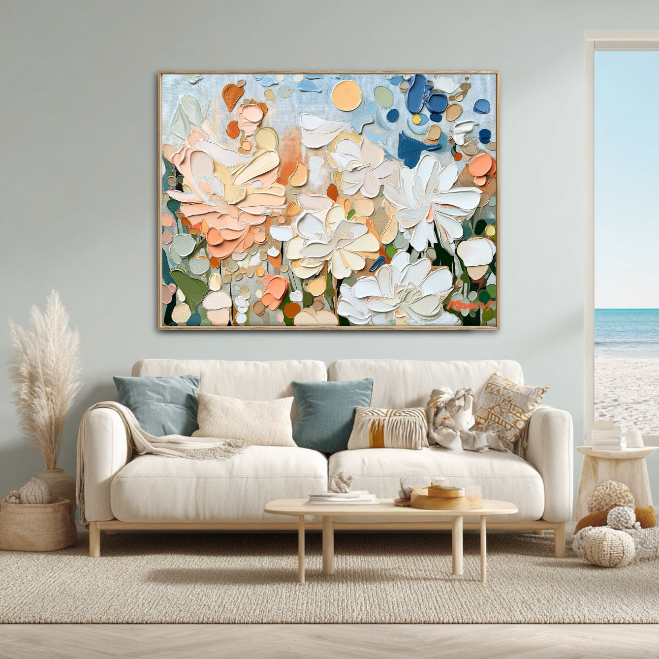 Impasto floral painting complements a serene coastal living room, harmonizing with the neutral sofa, ocean view, and light blue accents.