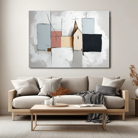 Abstract cottage art hangs over a low-profile wood and gray sofa, blending soft neutral colors with the Scandinavian-style living room decor.