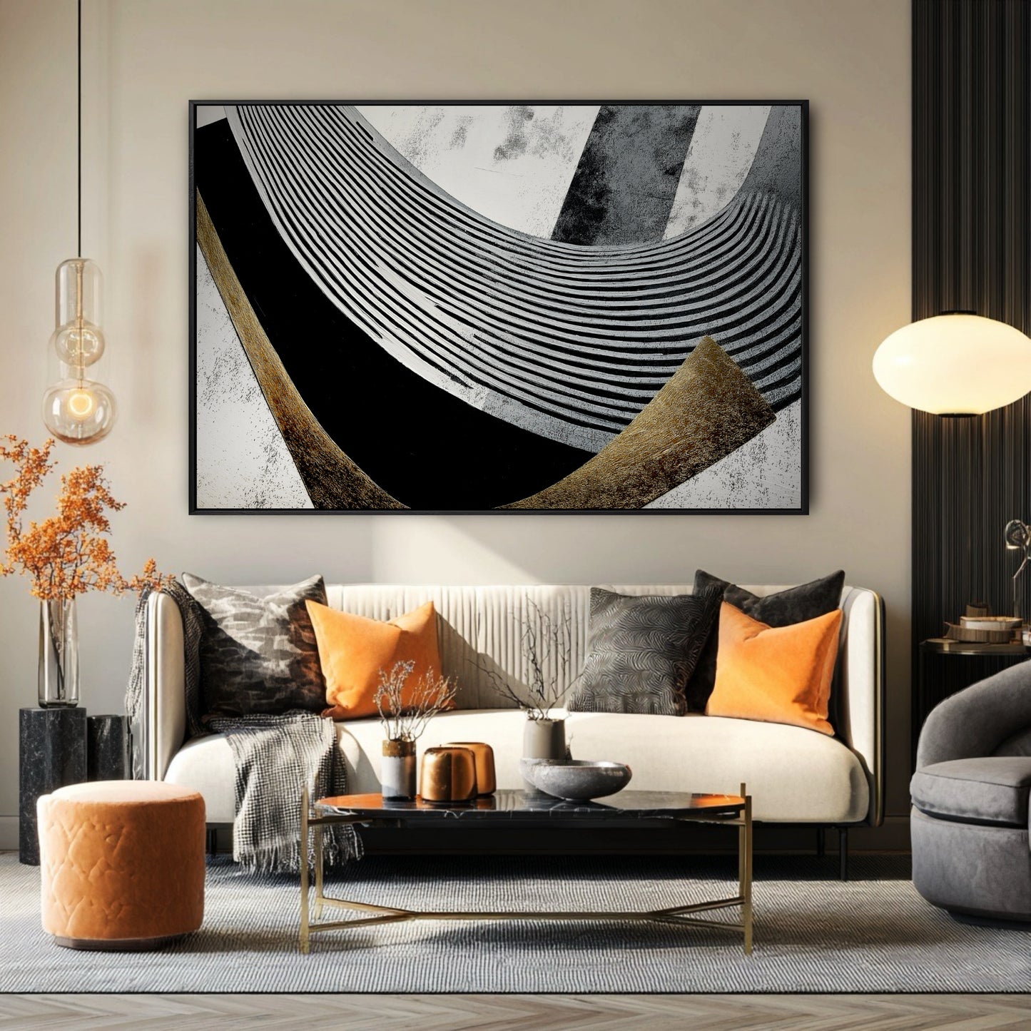 Large abstract op-art painting with gold accents above a sofa with bright orange pillows in a modern living room.