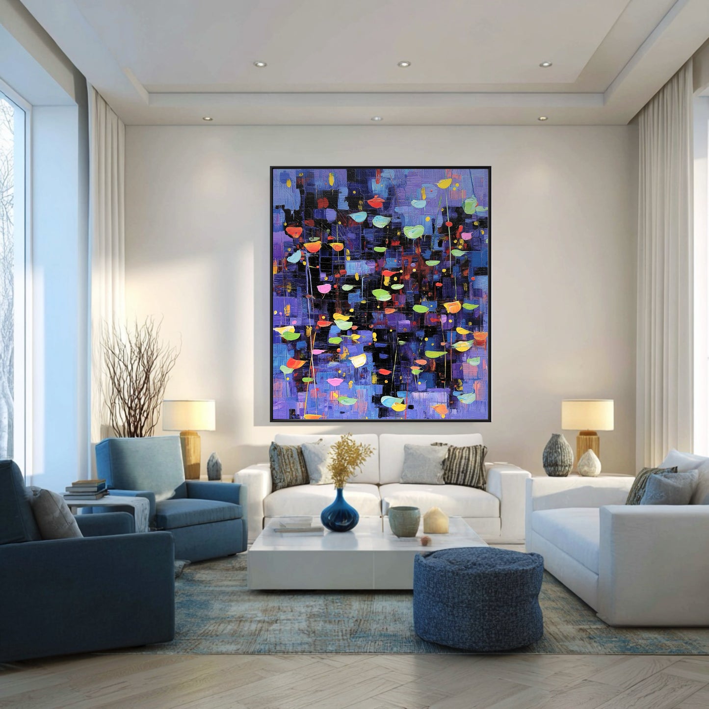 Original abstract painting hangs over a white sectional, introducing vibrant cool tones to a bright, minimalist living space.
