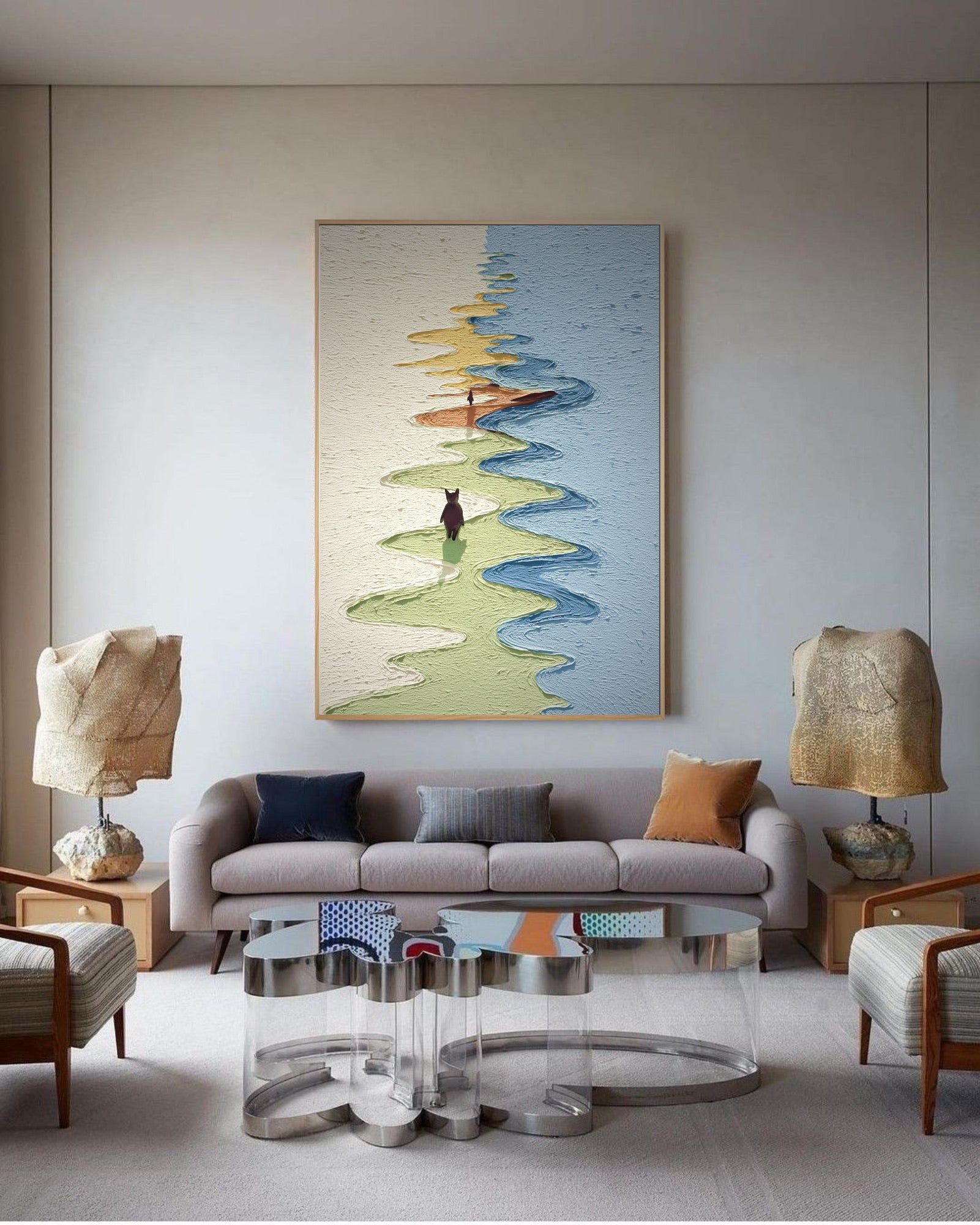 Modern living room with a gray sofa, abstract painting, and decorative lamps.