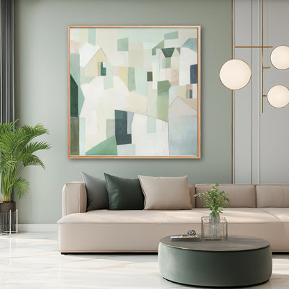 Modern living room with a beige sofa, abstract painting, and decorative elements.