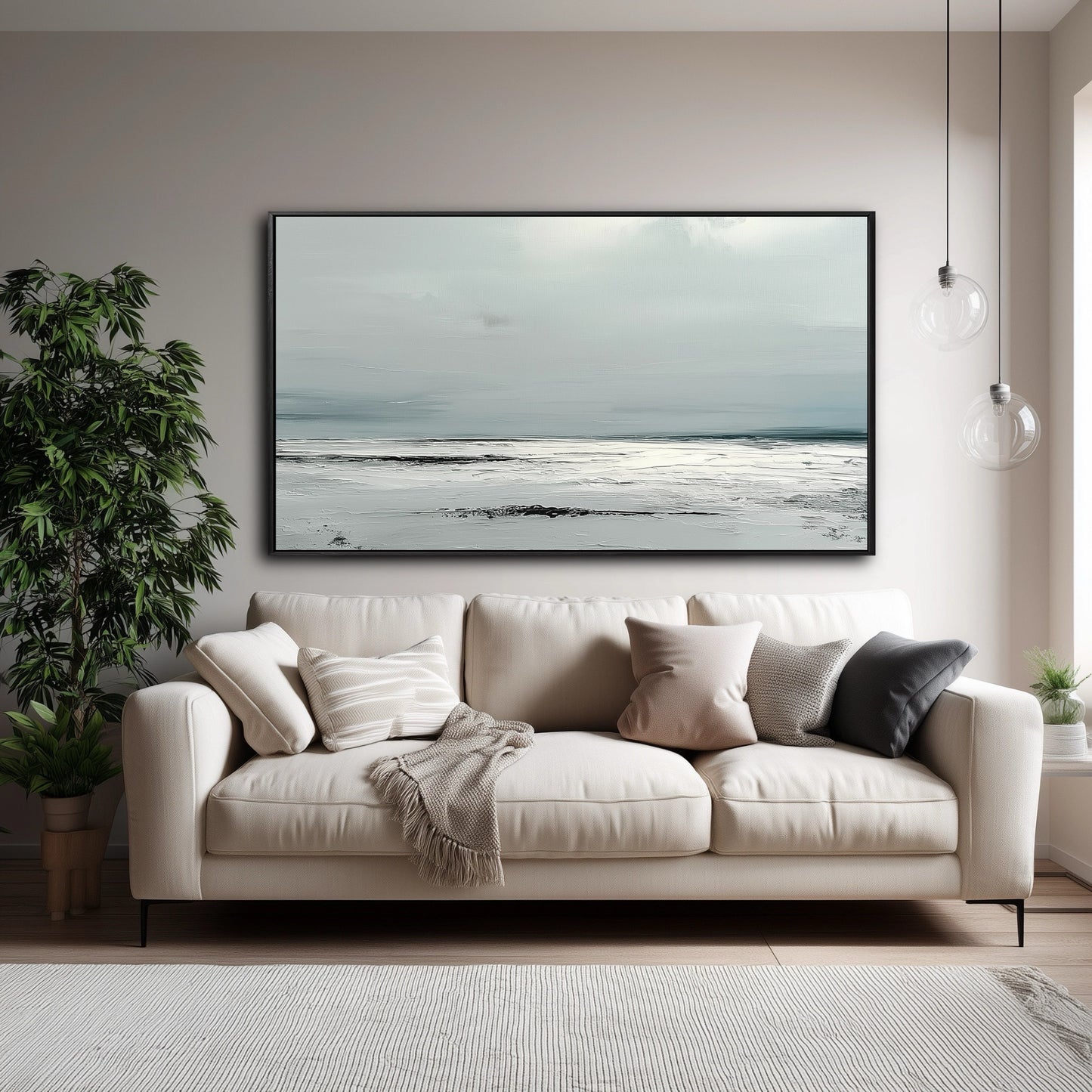 A large, textured abstract seascape hangs over a beige sofa in a modern, neutral-toned living room with a large houseplant.