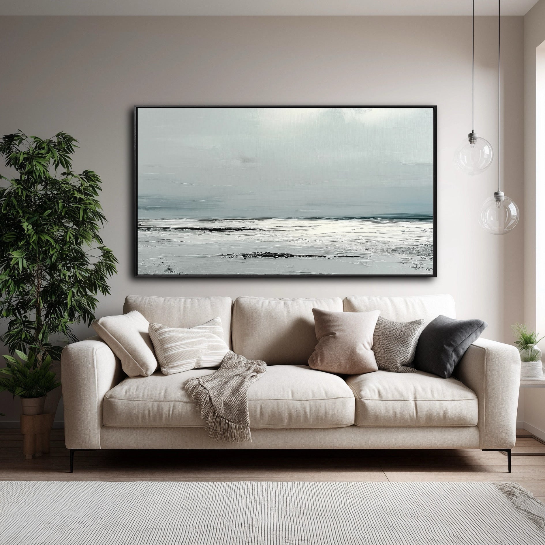 A large, textured abstract seascape hangs over a beige sofa in a modern, neutral-toned living room with a large houseplant.