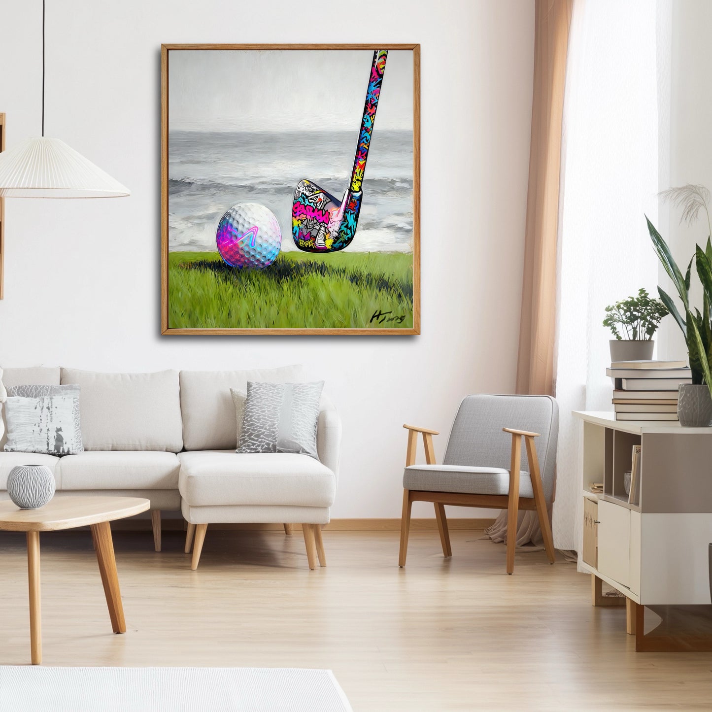 Graffiti golf art in bright Scandi living room. Neon colors pop against white walls and light wood for a fresh modern look.