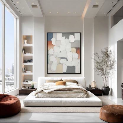 Modern bedroom with abstract art on the wall, large bed, and city view.