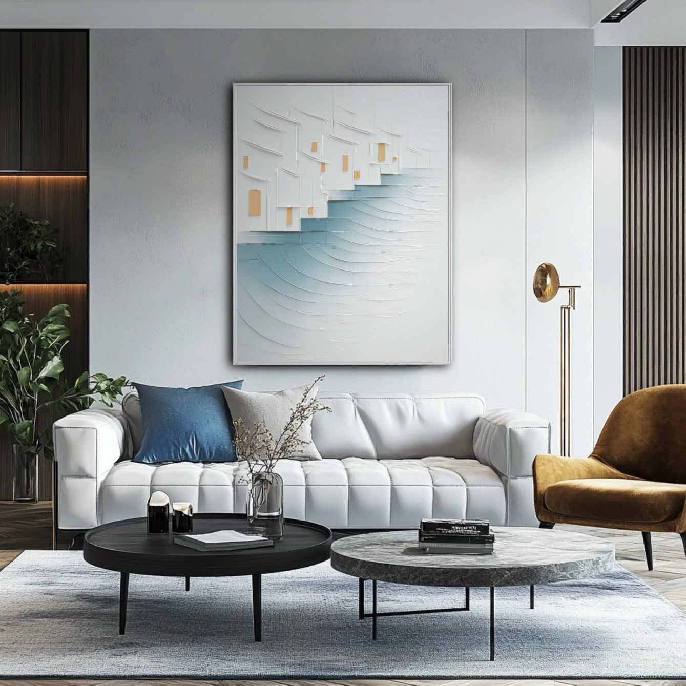 Modern living room with a white sofa, coffee table, and abstract art on the wall.
