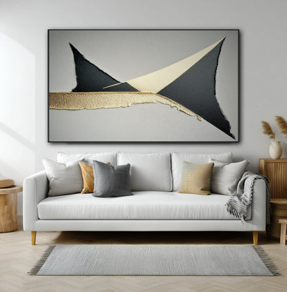 Large horizontal geometric art with black and gold shapes hanging over a modern white sofa in a contemporary living room.