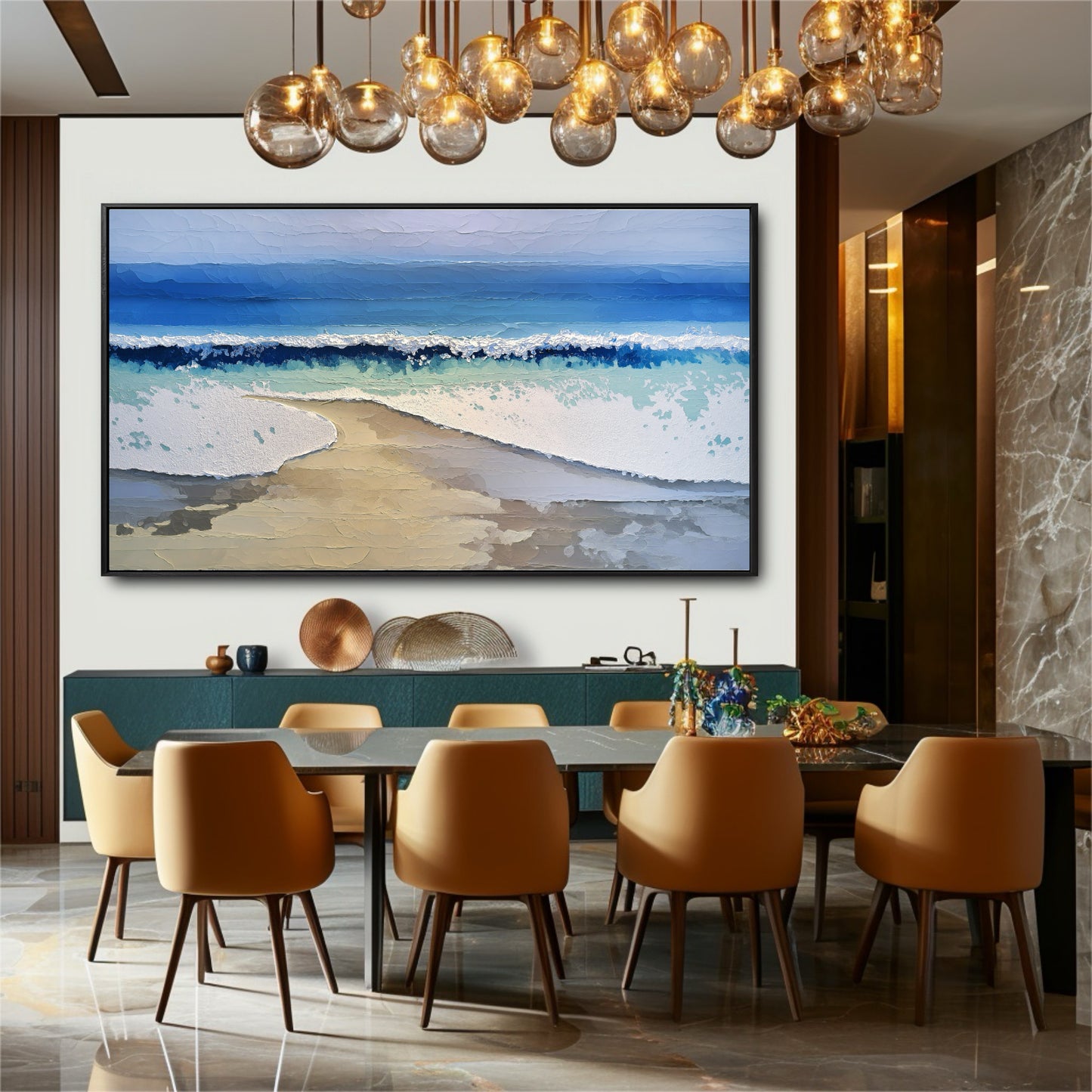 The serene beach painting provides a natural, cool-toned contrast to the luxurious gold lighting and warm chairs of a modern dining room.