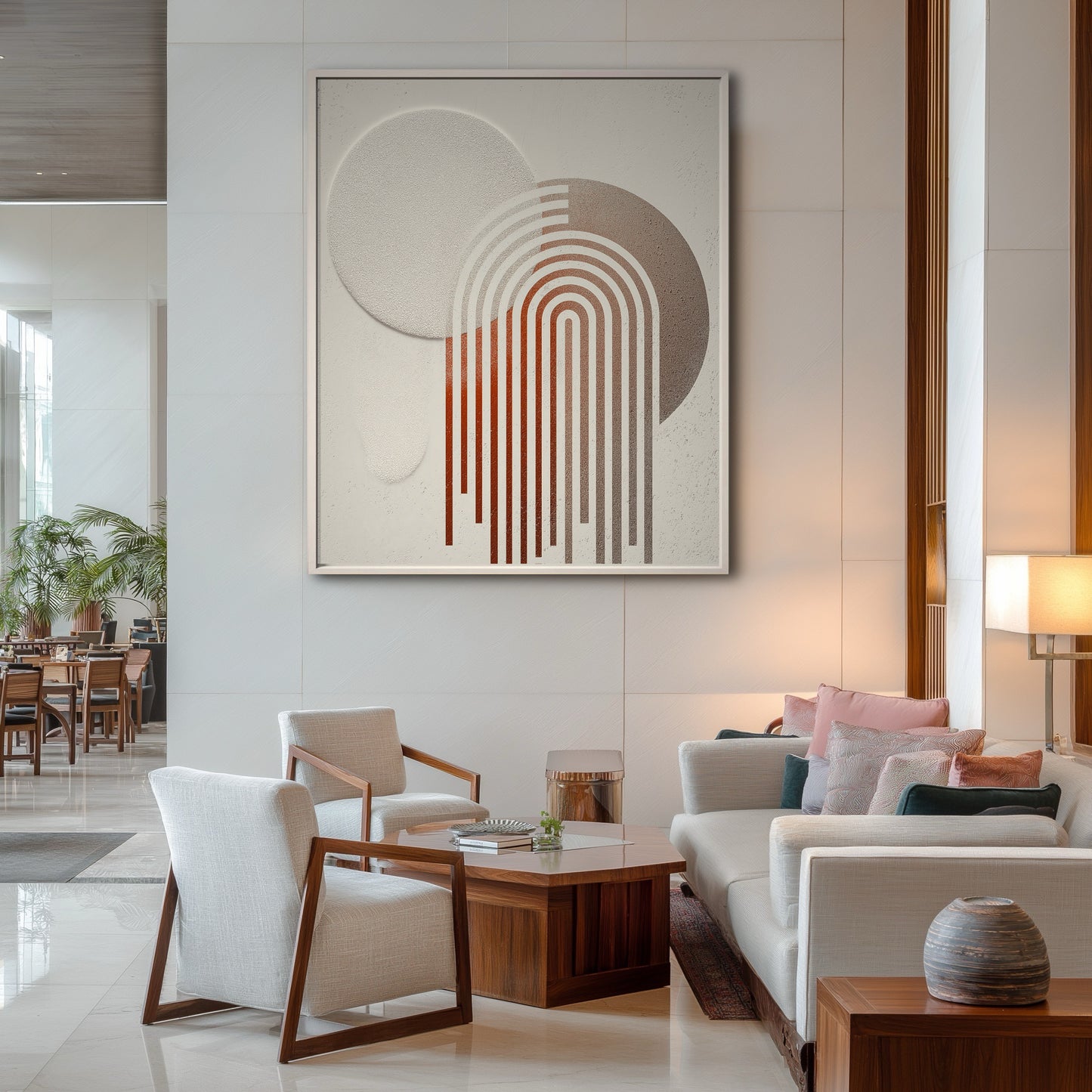 Large geometric abstract painting in a modern hotel lobby with contemporary lounge chairs and wood accent walls.