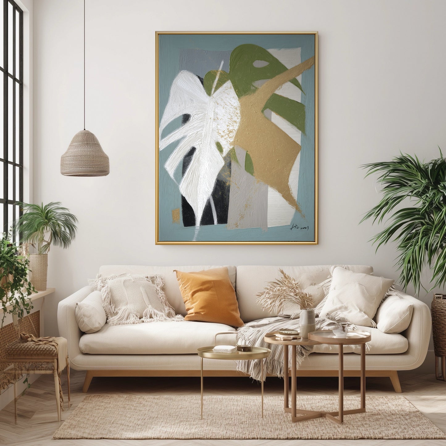 Abstract leaf wall art in a boho living space. The organic green and gold painting harmonizes with rattan decor and plants.