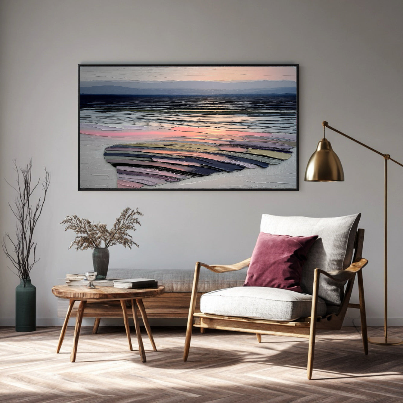 Colorful textured art in a stylish reading corner with a wood-framed armchair, dark red pillow, and warm brass floor lamp.