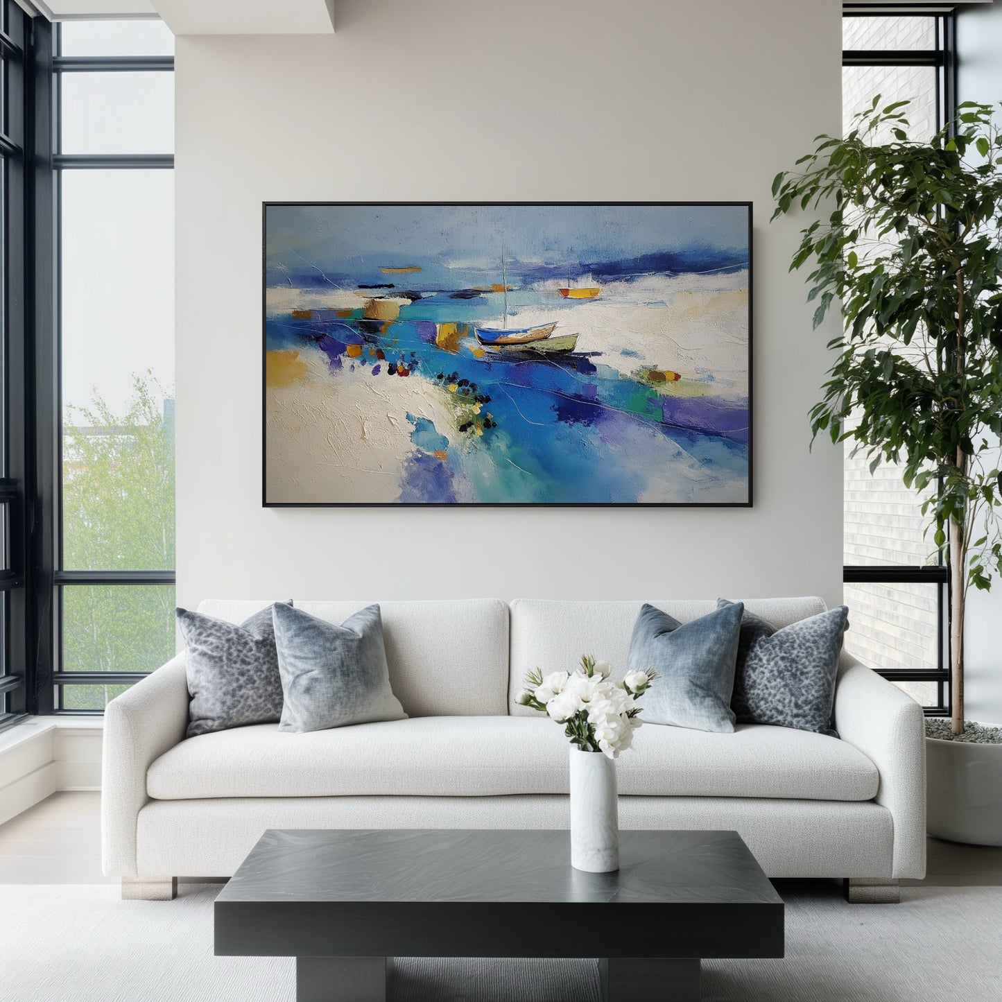 Textured abstract art offering a coastal escape above a white sofa in a contemporary urban room with large windows and a sleek black table.