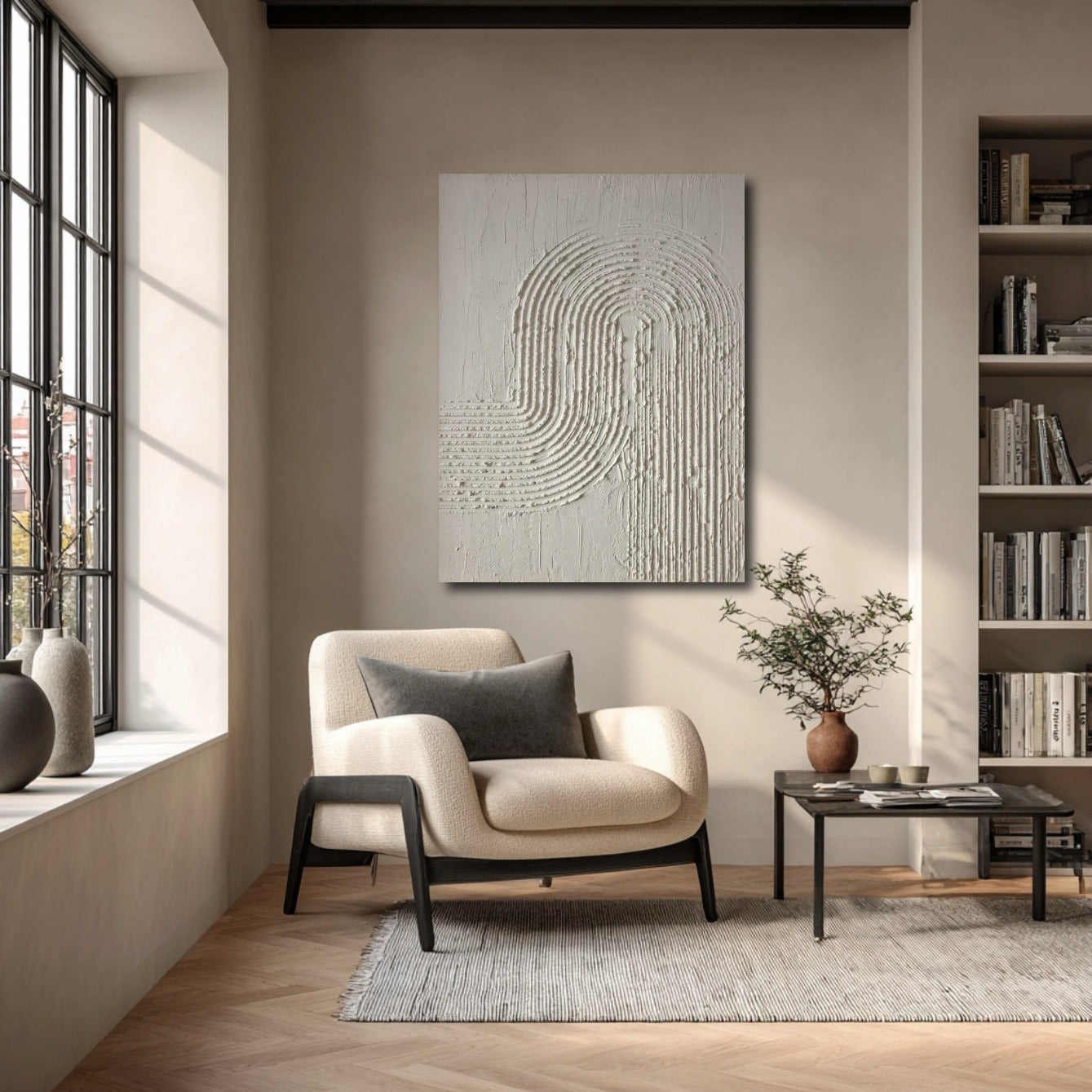 Abstract original painting brightening a cozy reading corner with a plush armchair, large window, and built-in bookshelf.