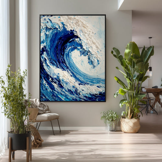 The large vertical ocean painting's natural theme complements the tall houseplants and airy, minimalist decor in this bright living space.