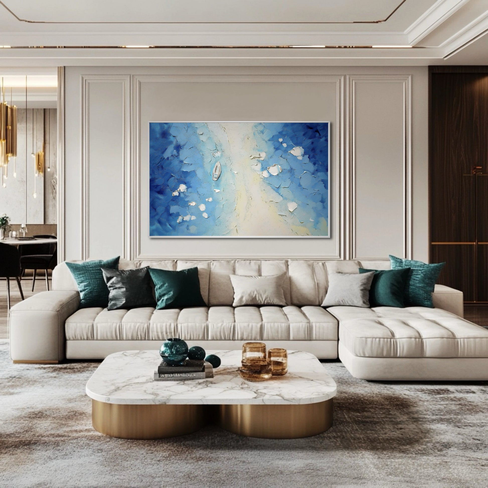 Vibrant blue impasto art serving as a jewel-toned accent above a luxury tufted sectional, complementing the gold trim and marble table.