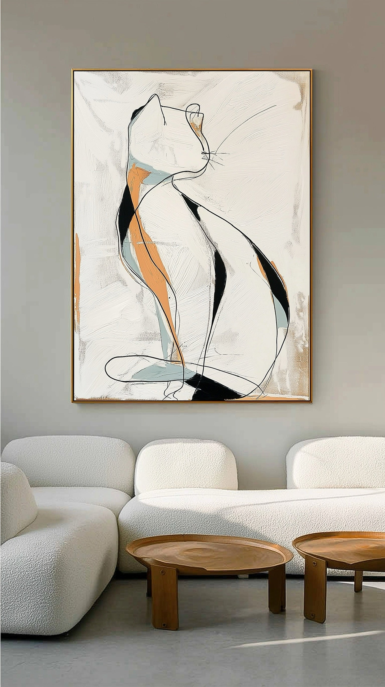 Vertical abstract line art cat contrasts with the soft, curved edges of the modular white sofa and mid-century modern tables.