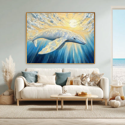 A large whale painting hangs over a white sofa in a bright, coastal living room with a beach view window.