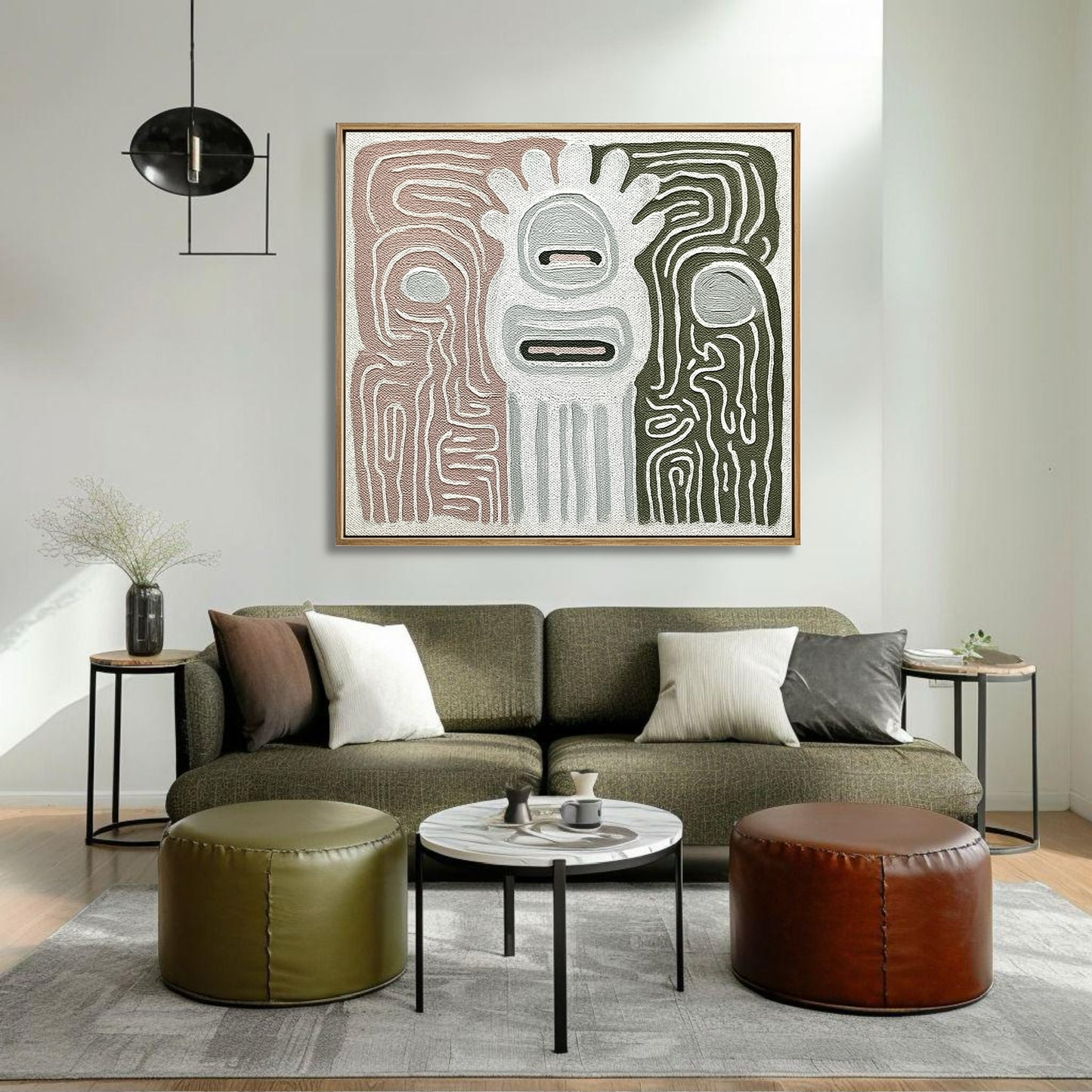 Abstract canvas featuring sage and rose tones over an olive green sofa in a relaxed, earthy-toned living space.